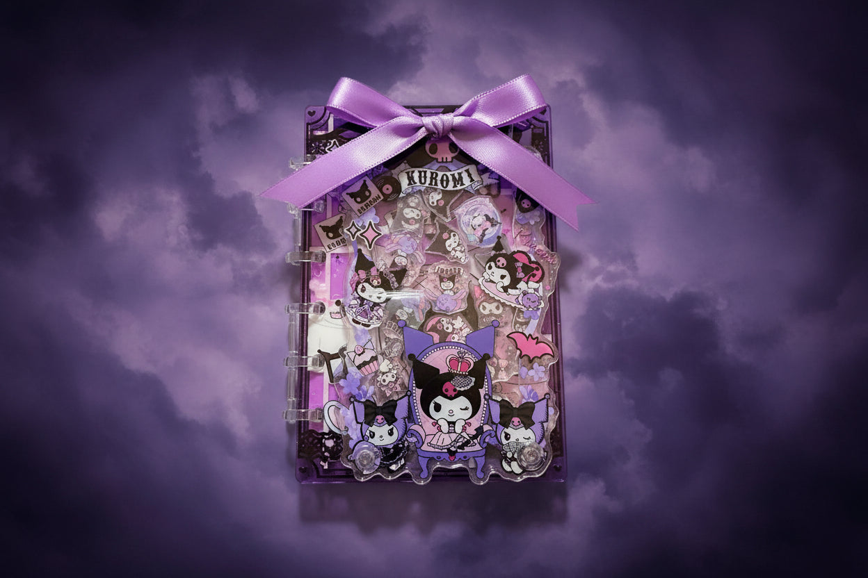 NOTEBOOK IN THE MIDDLE OF PURPLE BOWE WITH CLOUDY BLACK AND PURPLE BACKROUND